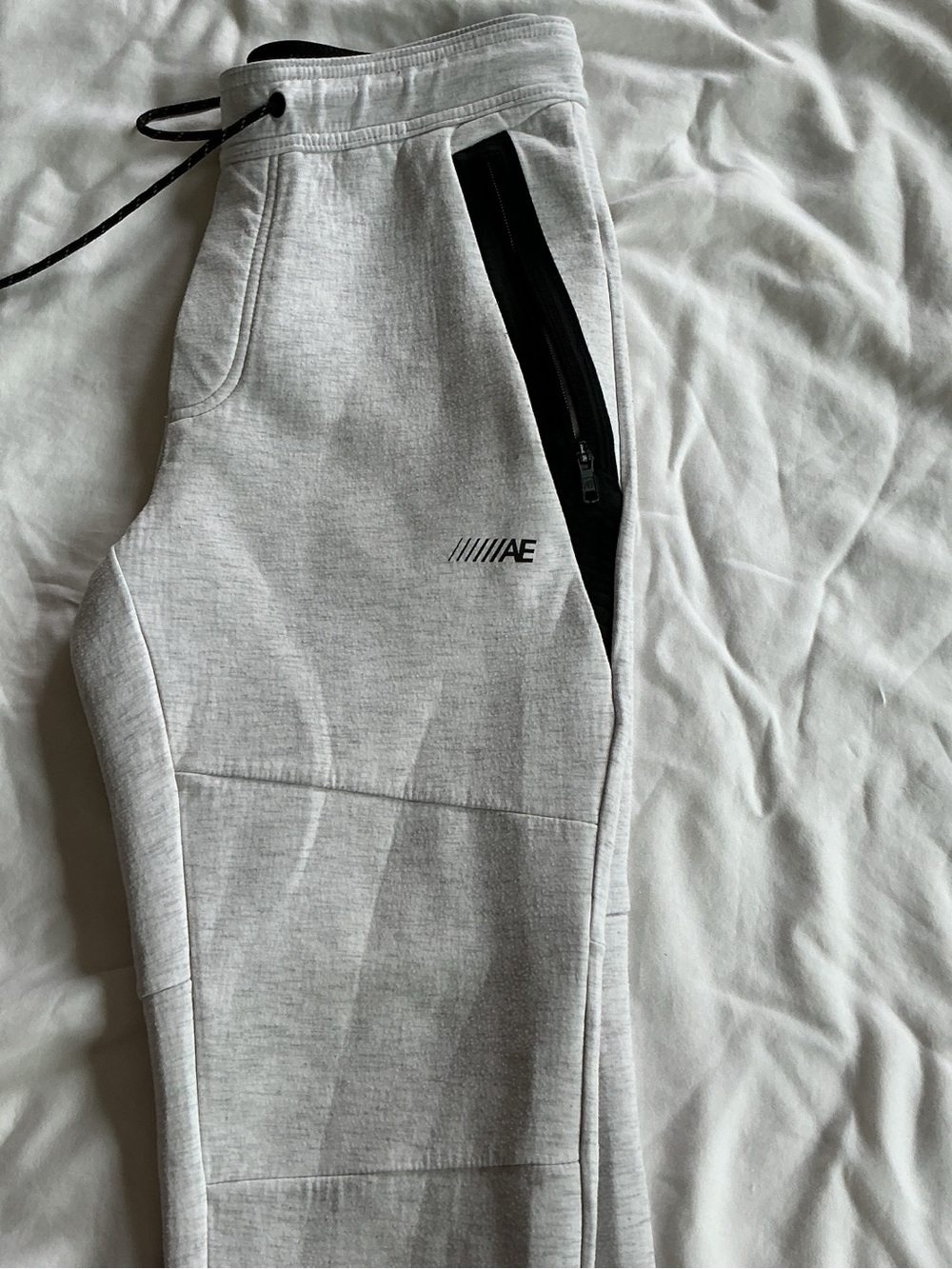 American Eagle Outfitters Light Gray Jogger Pants with Black Zip Detail